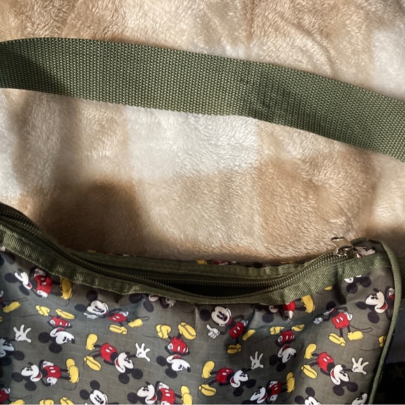 Green insulated small Disney Mickey Mouse tote purse over shoulder. - Picture 4 of 4